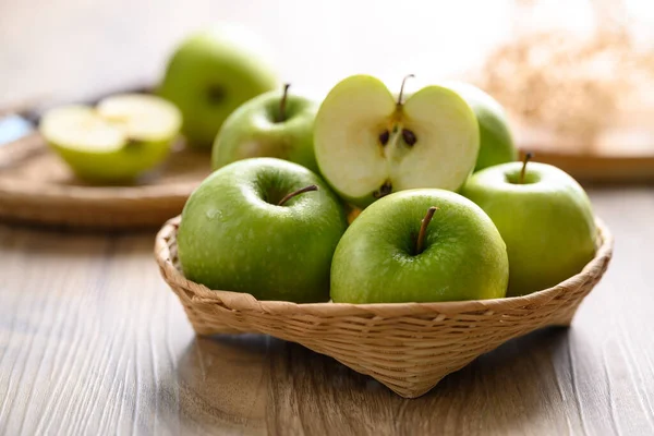 stock image Green apple fruit in basket on wooden background, Healthy fruit