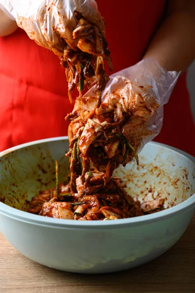 stock image Korean food, Kimchi cabbage cooking with hand, Homemade fermented side dish