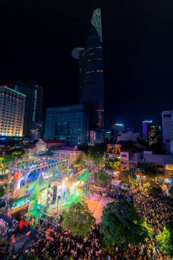 Ho Chi Minh City, Vietnam - 02 Sep, 2022: Vibrant and crowded scene on Nguyen Hue walking street and flower street during Lunar New Year and National Day at downtown of Ho Chi Minh City, Vietnam