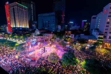 Ho Chi Minh City, Vietnam - 02 Sep, 2022: Vibrant and crowded scene on Nguyen Hue walking street and flower street during Lunar New Year and National Day at downtown of Ho Chi Minh City, Vietnam