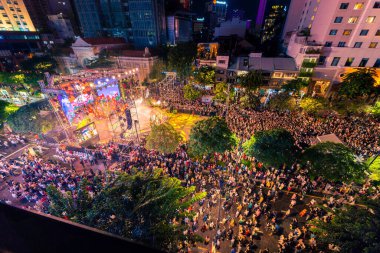 Ho Chi Minh City, Vietnam - 02 Sep, 2022: Vibrant and crowded scene on Nguyen Hue walking street and flower street during Lunar New Year and National Day at downtown of Ho Chi Minh City, Vietnam