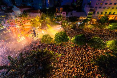 Ho Chi Minh City, Vietnam - 02 Sep, 2022: Vibrant and crowded scene on Nguyen Hue walking street and flower street during Lunar New Year and National Day at downtown of Ho Chi Minh City, Vietnam