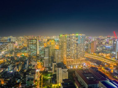 Ho Chi Minh city, Vietnam - 27 Aug 2022: Aerial panoramic cityscape view of Ho Chi Minh city and Saigon river, Vietnam. Center of heart business at downtown with buildings and towers.