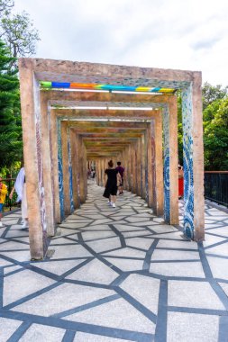 Da Nang, Vietnam - 12 Aug 2022: Many tourists on European style streets in Ba Na Hills Mountain Resort with amusement rides, attractions, restaurants.The famous tourist destination in Da Nang