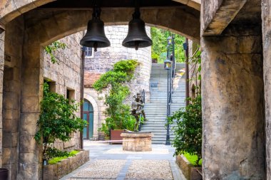 Da Nang, Vietnam - 12 Aug 2022: castle and European style streets in Ba Na Hills Mountain Resort with amusement rides, attractions, restaurants.The famous tourist destination in Da Nang