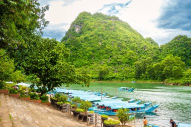 Phong Nha, Ke Bang cave, an amazing, wonderful cavern at Bo Trach, Vietnam, is world heritage of Viet Nam, traveller visit by boat on water. Travel and landscape concept.