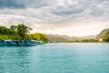 Phong Nha, Ke Bang cave, an amazing, wonderful cavern at Bo Trach, Vietnam, is world heritage of Viet Nam, traveller visit by boat on water. Travel and landscape concept.