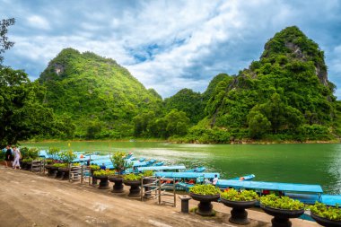 Phong Nha, Ke Bang cave, an amazing, wonderful cavern at Bo Trach, Vietnam, is world heritage of Viet Nam, traveller visit by boat on water. Travel and landscape concept.