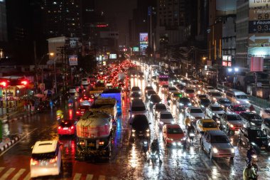 Bangkok, Thailand - 17 Aug 2022: communication background, the traffic Yaowarat Road in Chinatown, The big market is shopping and foods street. The one of landmarks at night in Bangkok, Thailand.