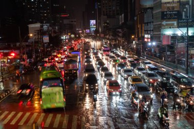 Bangkok, Thailand - 17 Aug 2022: communication background, the traffic Yaowarat Road in Chinatown, The big market is shopping and foods street. The one of landmarks at night in Bangkok, Thailand.