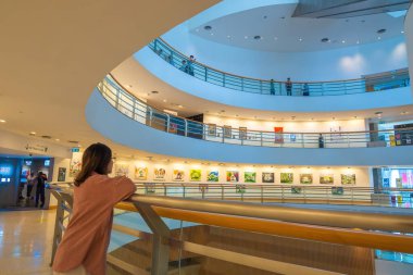 Bangkok, Thailand - Aug 17 2022: People visit the photo exhibition in Bangkok Art and Culture Center (BACC)