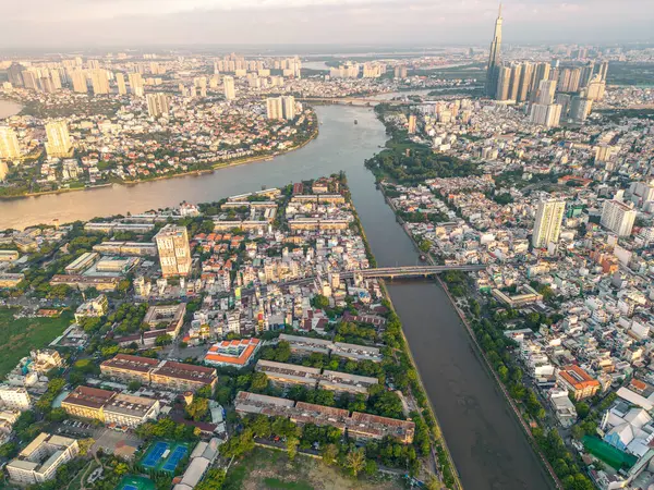 stock image Panoramic view of Saigon, Vietnam from above at Ho Chi Minh City's central business district. Cityscape and many buildings, local houses, bridges, rivers. Travel and landscape concept.