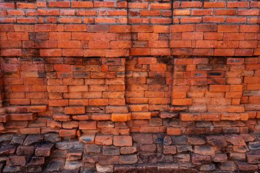 Klasik kırmızı ve kahverengi duvar arkasını kapatın. Grunge 'un geçmişi. - Brick. Kırsal biçim.