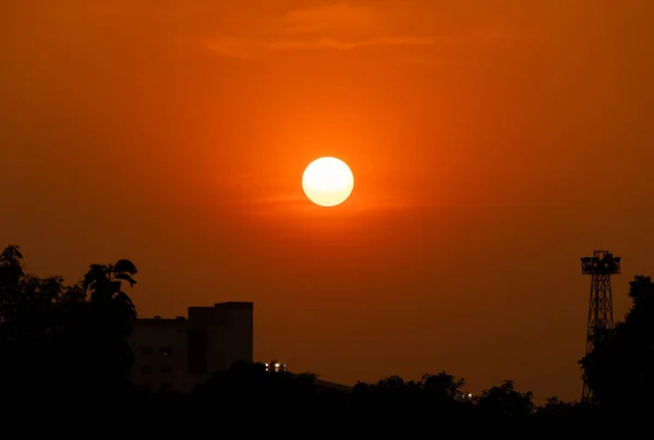 stock image Sunset or sunrise near silhouette horizon on red sky