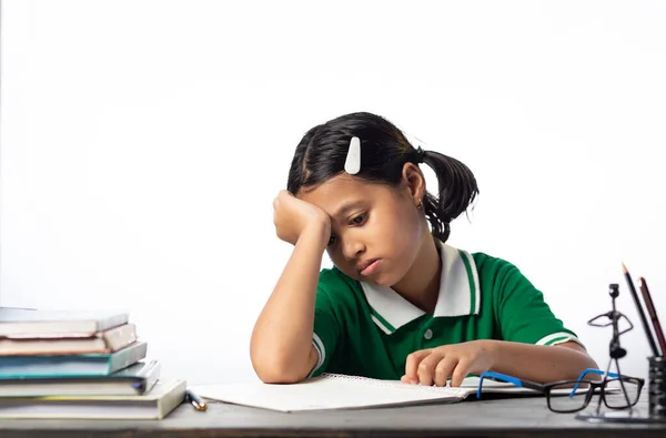 Pretty Beautiful Indian Schoolgirl Child Exhausted Study Table White Background — Stock Photo, Image