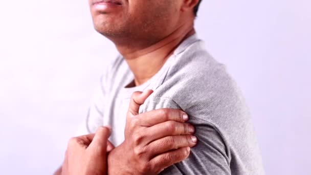 Indian Man Suffering Shoulder Pain Showing Painful Expression White Background — Stock Video