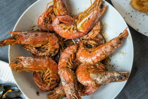 Red prawns cooked with garlic and parsley. Typical Mediterranean and Spanish food. Spanish tapas