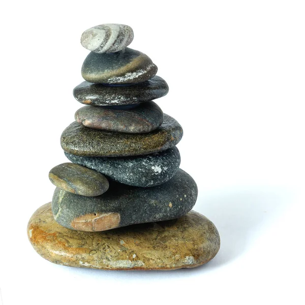 Pyramid Tower Dark Sea Pebbles Various Shapes White Background Isolated — Stock Photo, Image