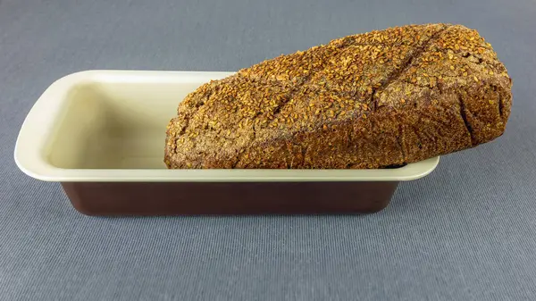 Loaf Dark Rye Bread Sesame Seeds Baking Pan Table Cloth — Stock Photo, Image