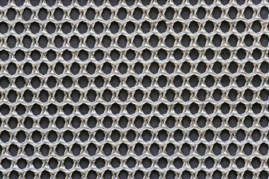 Metalik lif peçete dokusu arka planının yakın çekimi, karmaşık örgü tasarımı ve parlaklığını gözler önüne seriyor..