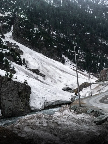 stock image Beautiful winter landscape with snow covered trees and mountains in Kashmir.