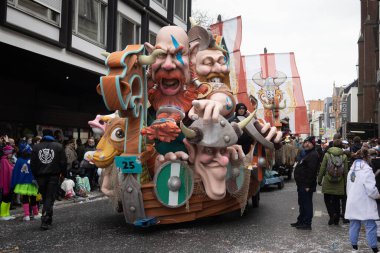 AALST, BELGIUM, 19 FEBRUARY 2023: Viking themed Carnival float in Aalst's annual Mardi Gras street parade. The annual Carnival parade attracts around 1000.00 spectators each year. 
