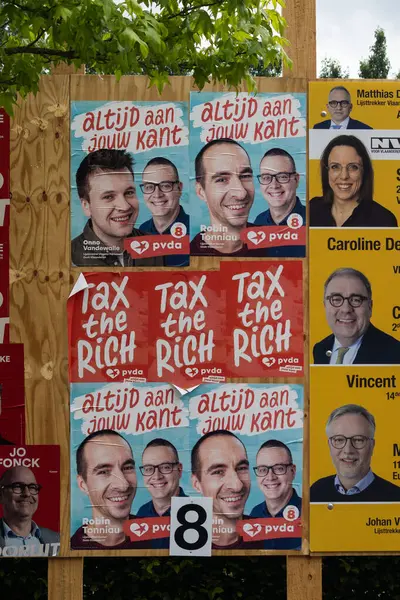 stock image AALST, BELGIUM, 30 MAY 2024: Political posters for the far left Workers Party a Marxist and socialist political party in Belgium. Parlimentary and European Elections take place on June 9th 2024.