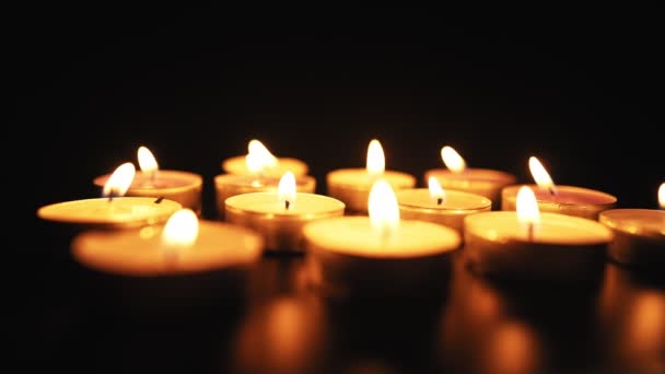Candles Burn Soft Yellow Flame Dark Religion Funeral Concept Sorrow — Vídeo de Stock