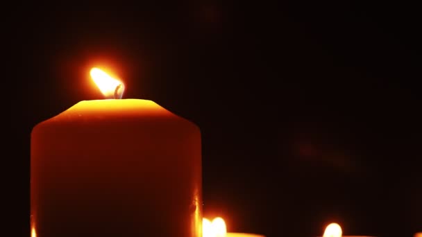 Candles Burn Soft Yellow Flame Dark Religion Funeral Concept Sorrow — Vídeo de stock