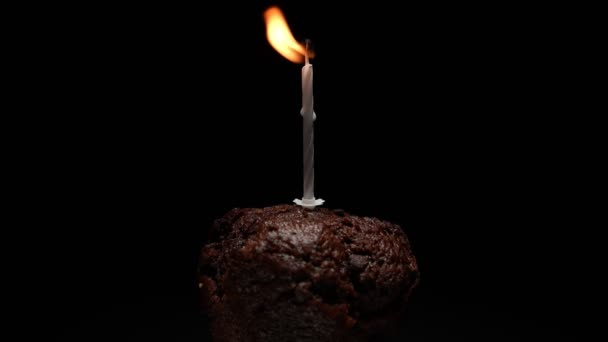 Chocolate Muffin Burning Candle Black Background Concept Memorial Services Religion — Wideo stockowe