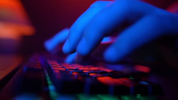 Close Unrecognizable Man Using Computer Keyboard Code Website Neon Lighting — Video