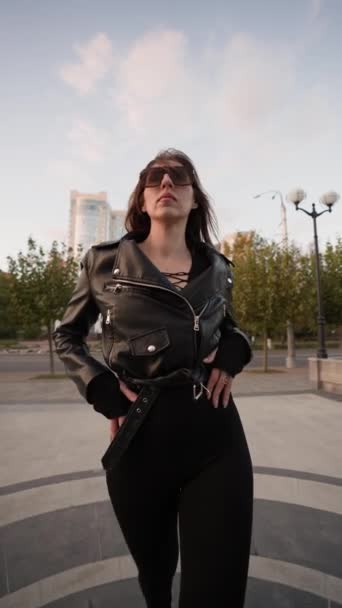 Seductive Slim Woman Black Tight Outfit Leather Jacket Walks Confident — Stock Video