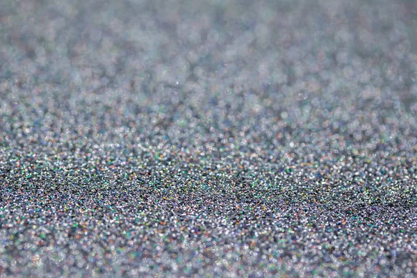 Stock image Silver color macro sparkling glitter texture background with vibrant color