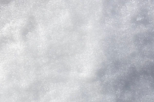雪のフルフレームマクロ抽象的なテクスチャ背景は 自然の太陽の下で溶融し始め — ストック写真