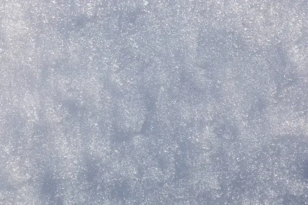 雪のフルフレームマクロ抽象的なテクスチャ背景は 自然の太陽の下で溶融し始め — ストック写真