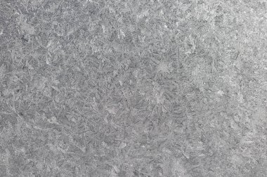 Buzlu cam pencerenin tam kare makro desen arkaplanı. İnci beyazının renk tonunda, kopyalama alanı olan.