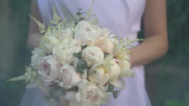 Bride White Dress Holds Her Hands Beautiful Delicate Wedding Bouquet — Stock Video