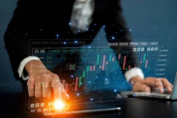 Business analysis technology, Businessman and finance analysis use digital tablets and computer notebooks to analyze financial graphs, stock market reports, and economic graph growth charts