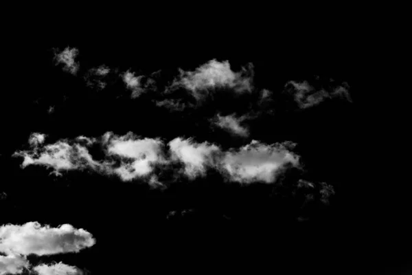 Real clouds and sky hi-res texture for design and retouch - abstract photo texture of the real clouds on the black background for adding and editing as a background layer in the Screen blending mode