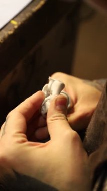 Man working on resin craft at workshop with the engraver