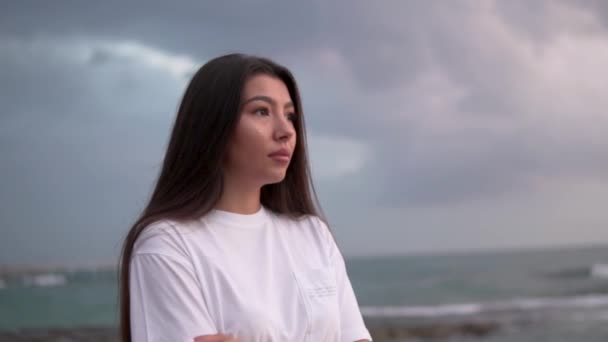 Close Portrait Young Woman Serious Thick Black Hair Looking Sunset — Stock Video