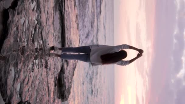 Vertical Video Young Woman Enjoys Sunset Sea — Stock Video
