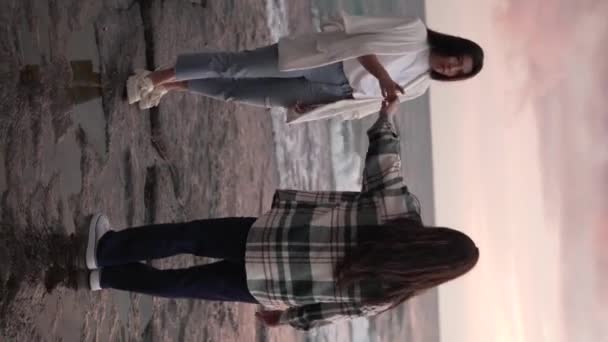 Vertical Video Beautiful Women Hug Each Other Sunset Oriental Mother — Stock Video
