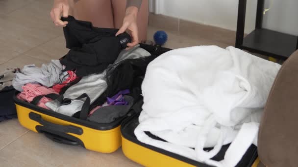Traveling Woman Pulls Things Out Yellow Suitcase Vacation — Vídeos de Stock
