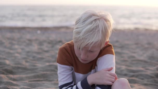 Handsome Brooding Boy Blonde Backdrop Sea — Video Stock