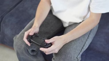 Close-up of womens hands with a playful joystick.