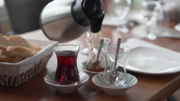 Faceless Man Pours Turkish Tea Teapot Glass Cups — Video
