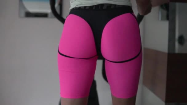 Close Sexy Female Butt Exercising Ellipse Gym — Video Stock