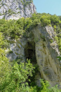 cave in the picturesque mountains. Genga, Marche, Italy. The Appennines. Natural background