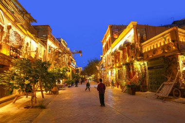 Kashgar, Çin-OCT, 25, 2024 - Çin 'in batısındaki Xinjiang' da bulunan Kashgar Old City 'deki Uygur sokak manzarası ve yaşam tarzı. Dünyanın en eski ve sürekli yerleşim olan şehirlerinden biridir..